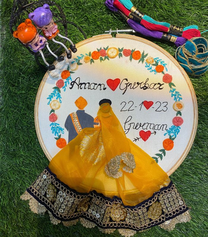 aman and gurbax wedding embroidery hoop